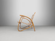 Functionalist_Bentwood_Lounge_Chair_by_Jan_Vaněk_with_Ivory_Woven_Straps,_Czechoslovakia,_1930s