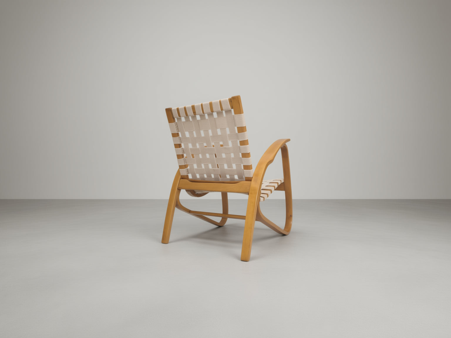 Functionalist_Bentwood_Lounge_Chair_by_Jan_Vaněk_with_Ivory_Woven_Straps,_Czechoslovakia,_1930s
