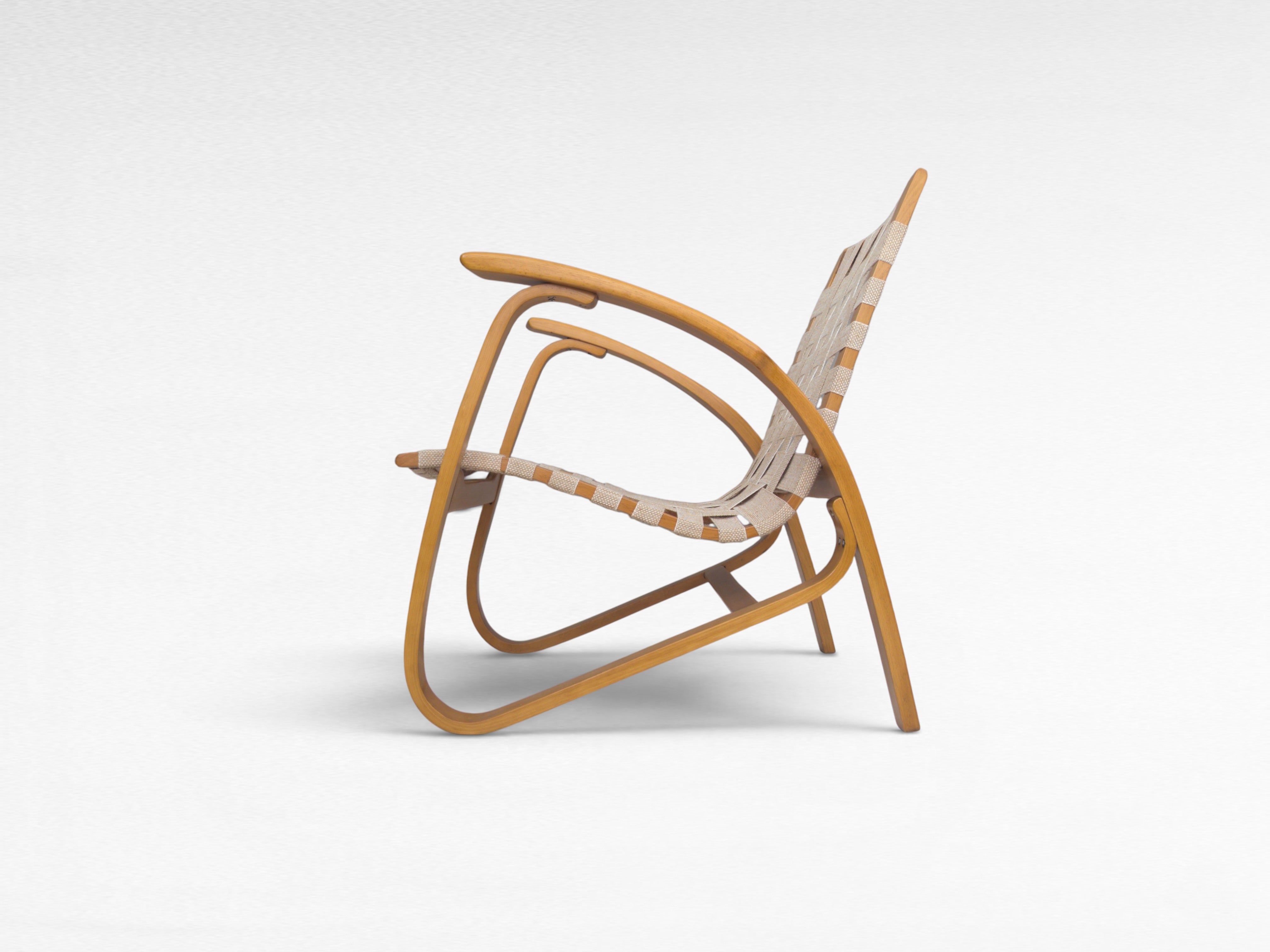 Functionalist_Bentwood_Lounge_Chair_by_Jan_Vaněk_with_Ivory_Woven_Straps,_Czechoslovakia,_1930s