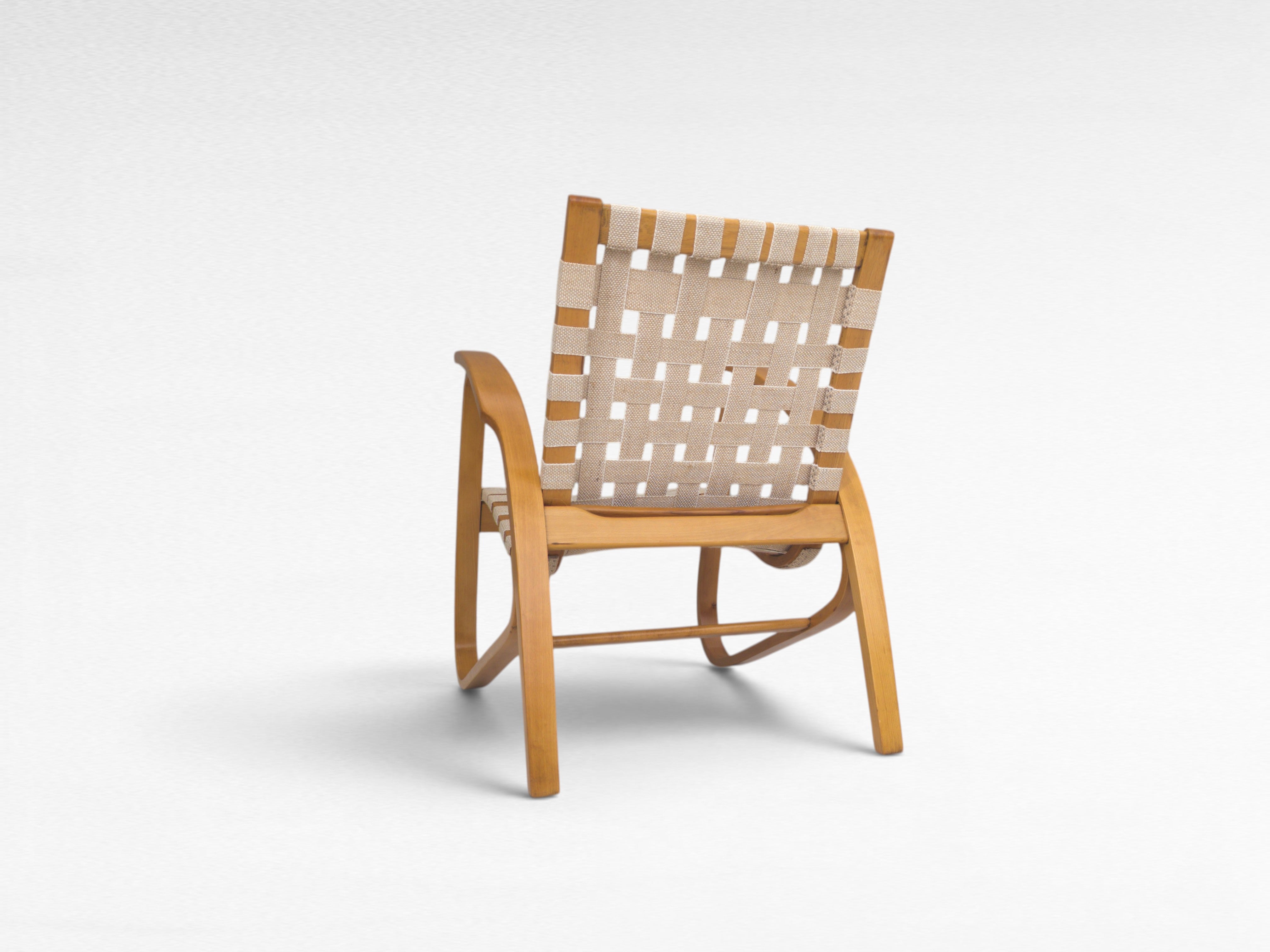 Functionalist_Bentwood_Lounge_Chair_by_Jan_Vaněk_with_Ivory_Woven_Straps,_Czechoslovakia,_1930s
