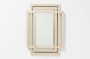 Sculptural_mirror_in_brass,_1970s_by_Philippe_Jean