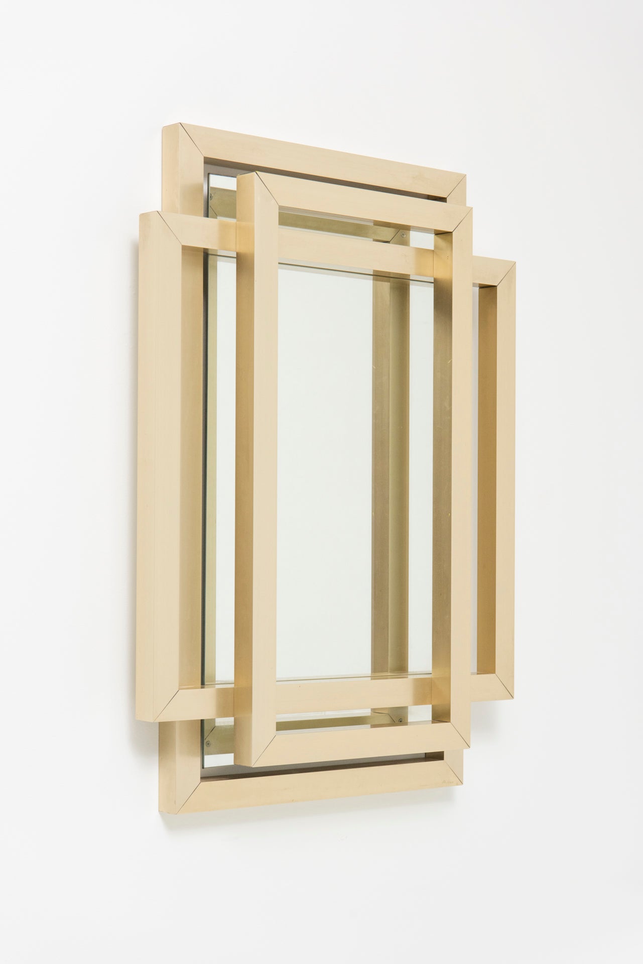 Sculptural_mirror_in_brass,_1970s_by_Philippe_Jean