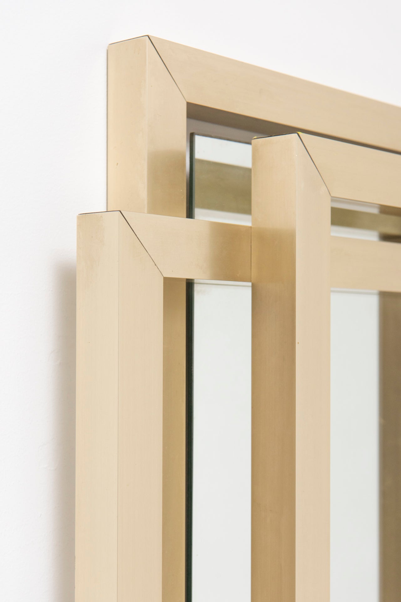 Sculptural_mirror_in_brass,_1970s_by_Philippe_Jean