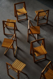 Set_of_12_Folding_Chairs_by_Aldo_Jacober_and_Pierangela_D’Aniello_for_Alberto_Bazzani,_Italy_1960s