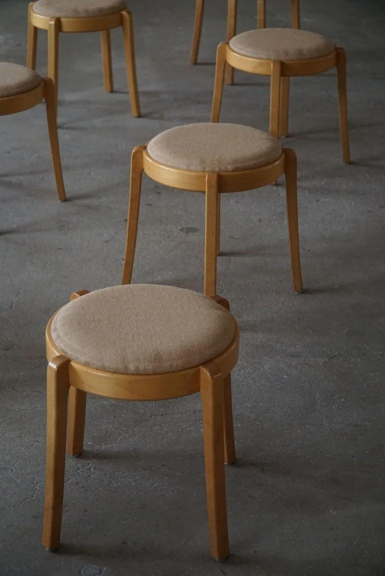 Set_of_14_Stackable_Stools_in_Birch_&_Hessian_in_Swedish_Modern,_1980s