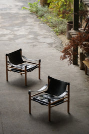 Set_of_2_Arne_Norell_‘Sirocco’_Safari_Chair_in_Leather,_Swedish_Mid_Century