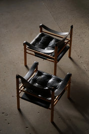 Set_of_2_Arne_Norell_‘Sirocco’_Safari_Chair_in_Leather,_Swedish_Mid_Century