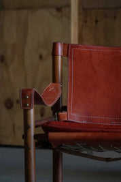 Set_of_2_Arne_Norell_Sirocco_Safari_Chairs_in_Rosewood_and_Red_Leather,_Sweden,_1960s