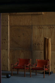 Set_of_2_Arne_Norell_Sirocco_Safari_Chairs_in_Rosewood_and_Red_Leather,_Sweden,_1960s