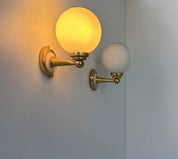 Set_of_2_Brass_and_Opaline_Glass_Wall_Sconces,_France_1980s