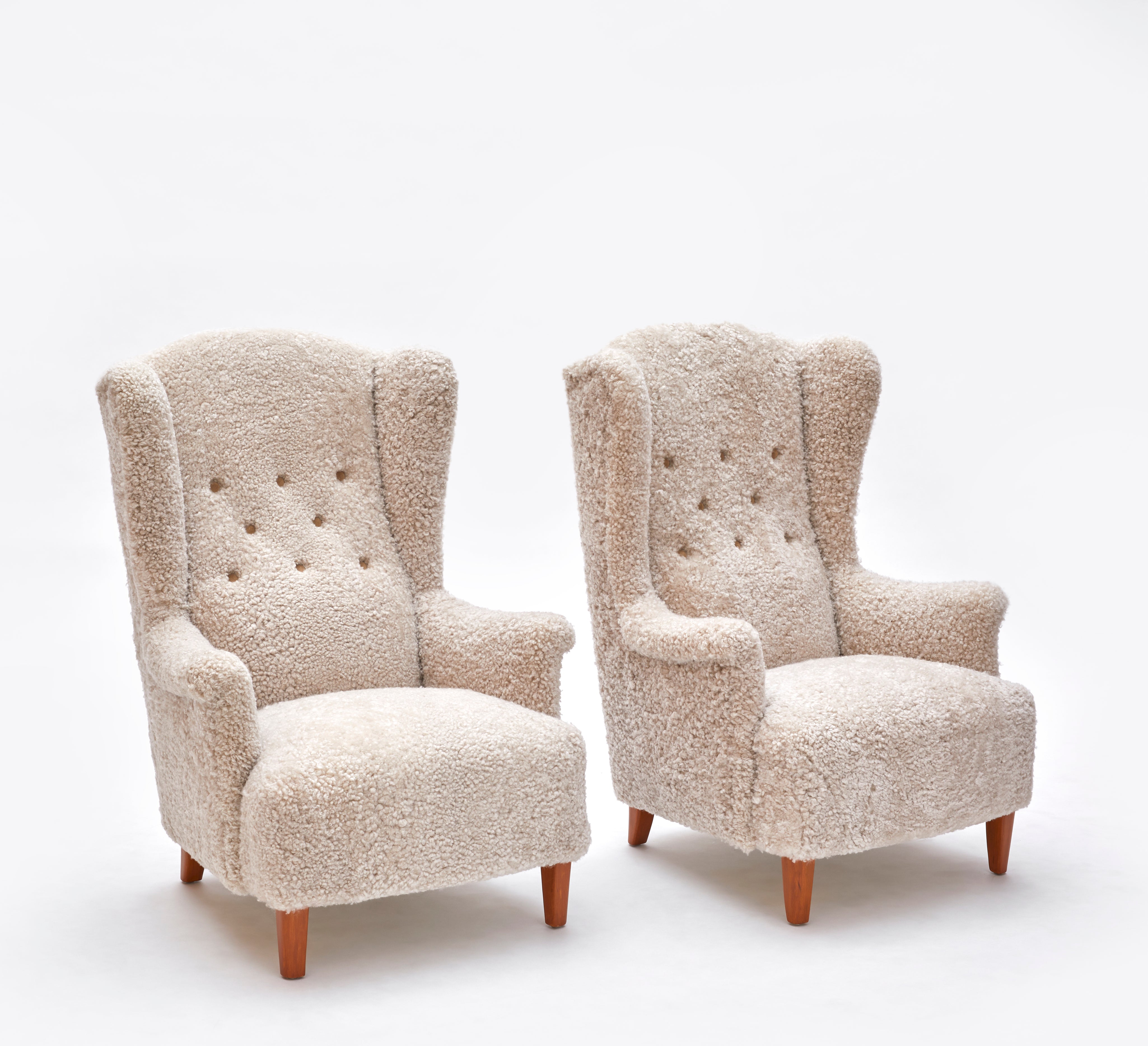 Set_of_2_Carl_Malmsten_Åldermannen_Wingback_Armchairs_in_Shearling