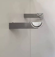 Set_of_2_Glass_and_Cast_Aluminum_Wall_Sconces_by_Lumière_Studio,_France_1970s