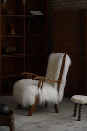 Set_of_2_Henning_Kjærnulf_Oak_Armchairs_with_Icelandic_Sheepskin,_Denmark_1950s