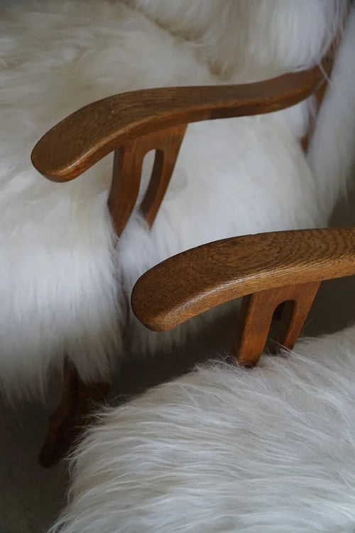 Set_of_2_Henning_Kjærnulf_Oak_Armchairs_with_Icelandic_Sheepskin,_Denmark_1950s