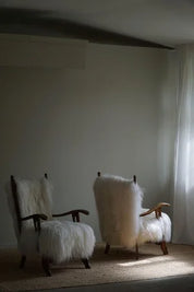 Set_of_2_Henning_Kjærnulf_Oak_Armchairs_with_Icelandic_Sheepskin,_Denmark_1950s