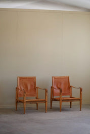 Set_of_2_Kaare_Klint_Safari_Chairs_in_Ash_and_Leather_for_Rud_Rasmussen,_Denmark_1960s