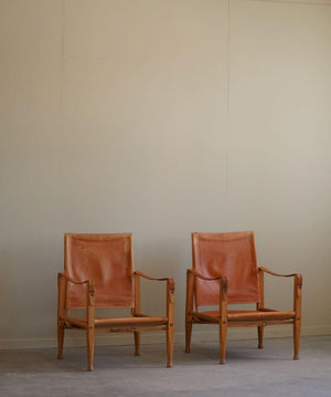 Set_of_2_Kaare_Klint_Safari_Chairs_in_Ash_and_Leather_for_Rud_Rasmussen,_Denmark_1960s