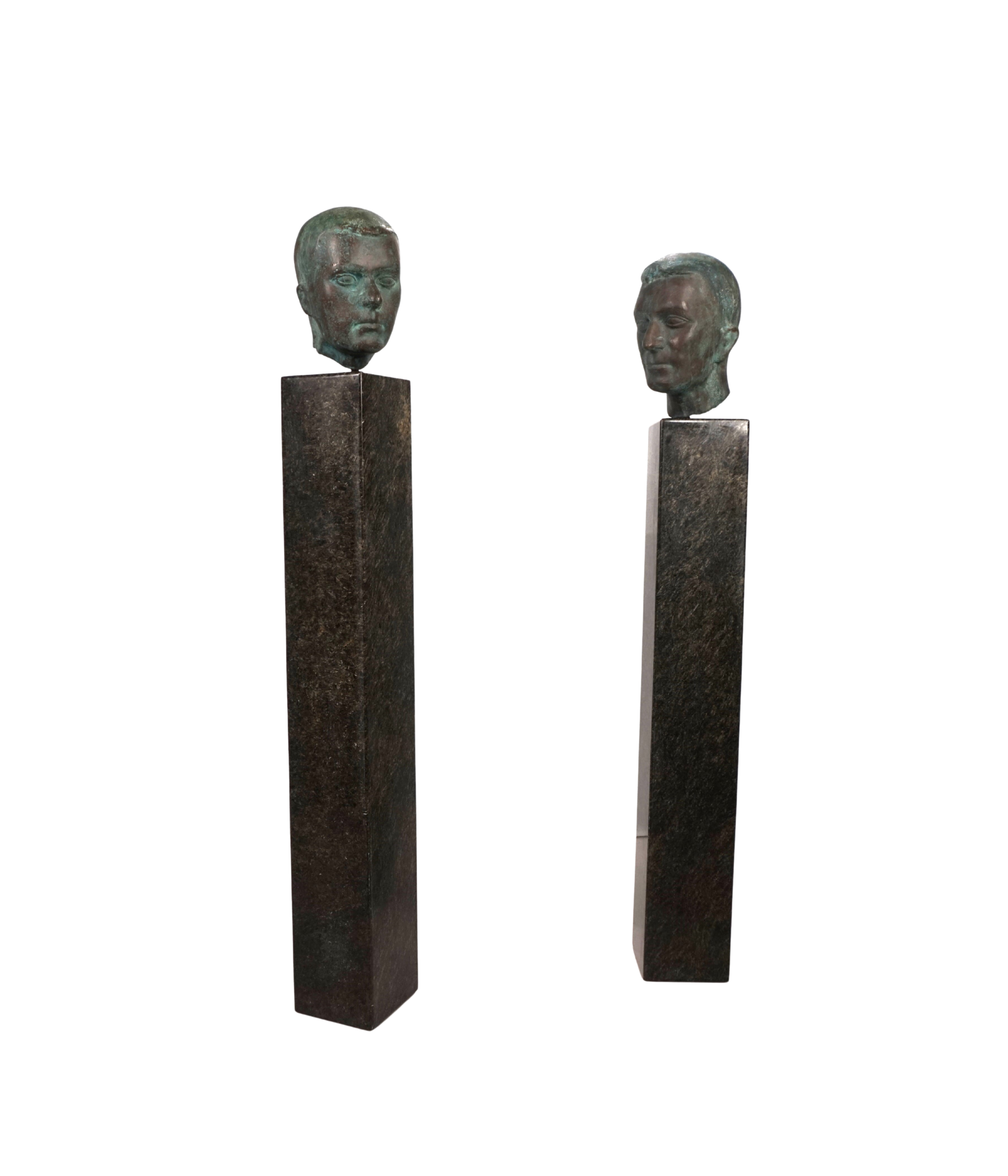 Set_of_2_Life-Size_Bronze_Male_Heads_on_Granite_Steles,_German_Bauhaus_Period,_circa_1920s