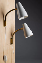 Set_of_2_Lisa_Johansson-Pape_Adjustable_Wall_Sconces_for_ORNO,_1960s,_Finland