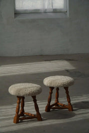 Set_of_2_Oak_Tripod_Stools_in_Danish_Modern,_Seats_in_Shearling_Lambswool,_1950s