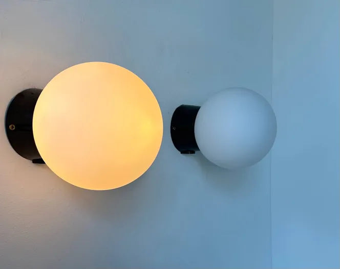 Set_of_2_Opaline_Glass_and_Bakelite_Wall_Sconces_by_RAAK,_Netherlands_1970s
