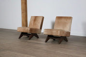 Set_of_2_Pierre_Jeanneret_‘Fireside’_Chairs,_model_No._PJ-SI-36-A