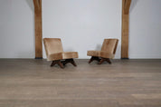 Set_of_2_Pierre_Jeanneret_‘Fireside’_Chairs,_model_No._PJ-SI-36-A