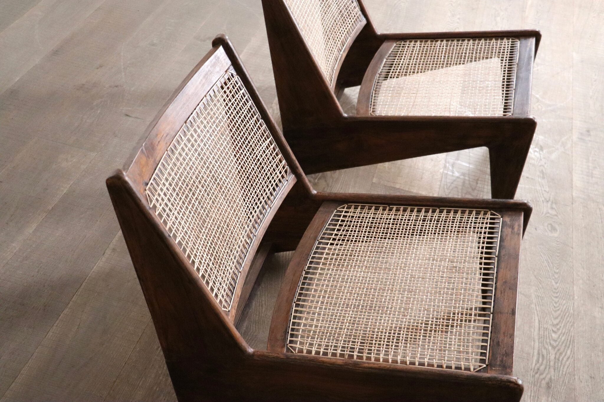 Set_of_2_Pierre_Jeanneret_Kangaroo_Chairs_PJ-SI-59,_India,_1955