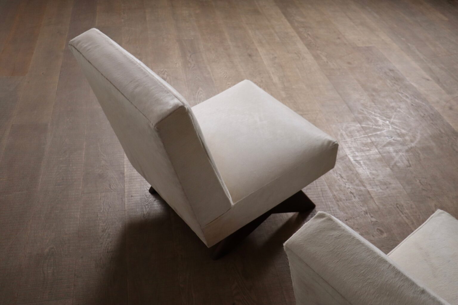 Set_of_2_Pierre_Jeanneret_PJ-SI-36-A_“Fireside”_Chairs,_Chandigarh,_India,_1966