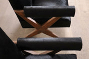 Set_of_2_Pierre_Jeanneret_PJ-SI-48-A_X-Leg_Lounge_Chairs_in_Teak_and_Black_Pony,_Chandigarh,_circa_1960
