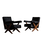 Set_of_2_Pierre_Jeanneret_PJ-SI-48-A_X-Leg_Lounge_Chairs_in_Teak_and_Black_Pony,_Chandigarh,_circa_1960