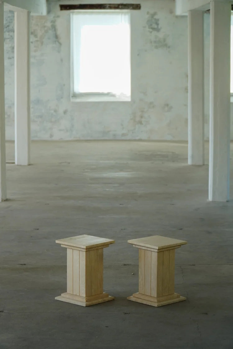 Set_of_2_Sculptural_Travertine_Display_Pedestals,_Italy,_1970s