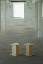 Set_of_2_Sculptural_Travertine_Display_Pedestals,_Italy,_1970s