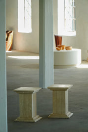 Set_of_2_Sculptural_Travertine_Display_Pedestals,_Italy,_1970s