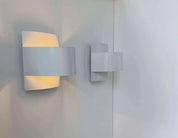 Set_of_2_White_Lacquered_Metal_Wall_Sconces_by_Peter_Celsing,_Scandinavian_Modern,_Sweden_1960s