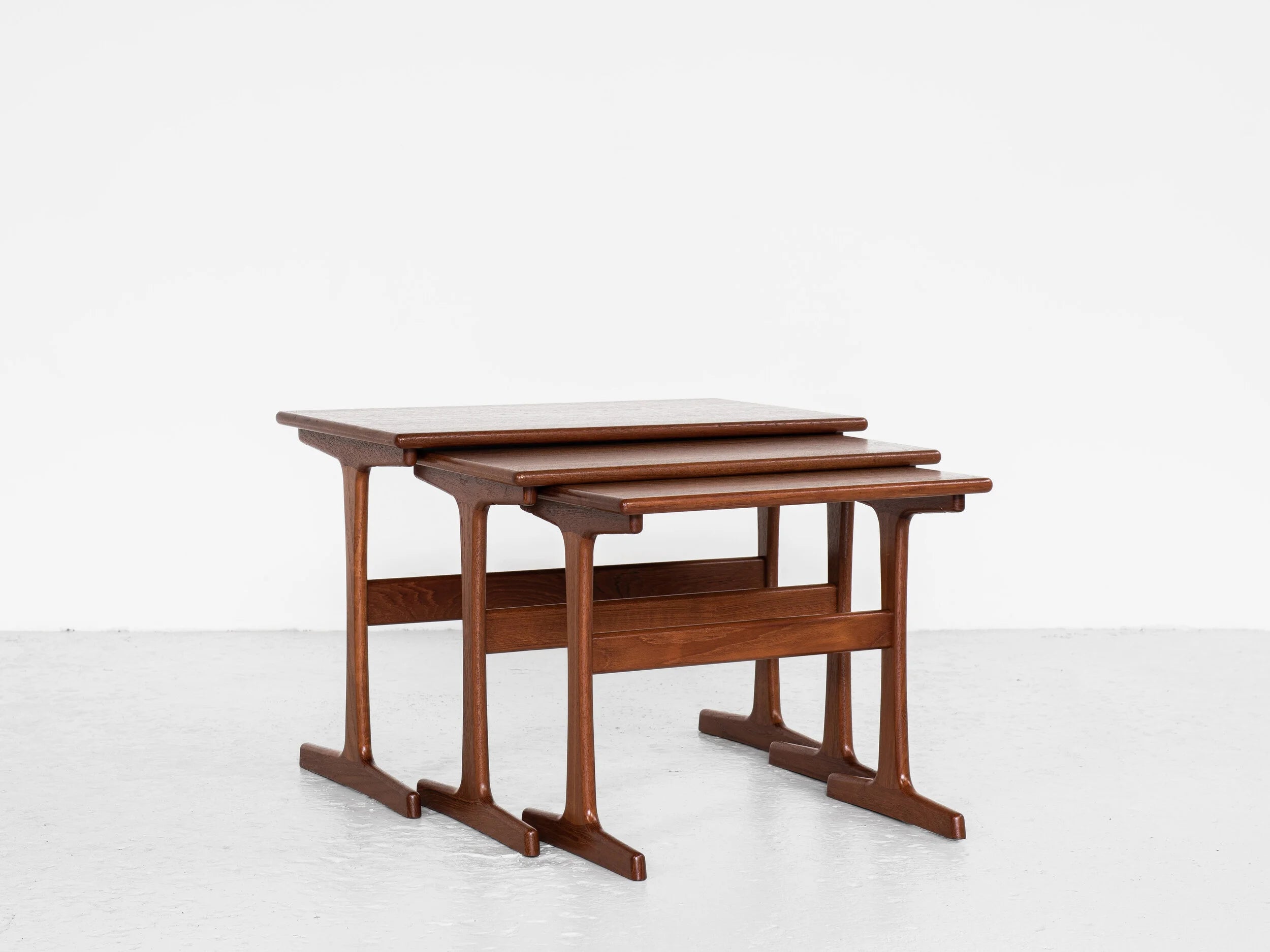 Set_of_3_Midcentury_nest_side_tables_in_teak_by_Kai_Kristiansen_for_Vildbjerg