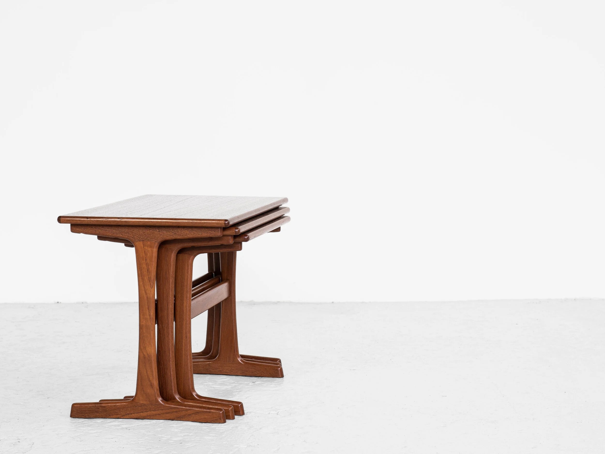 Set_of_3_Midcentury_nest_side_tables_in_teak_by_Kai_Kristiansen_for_Vildbjerg
