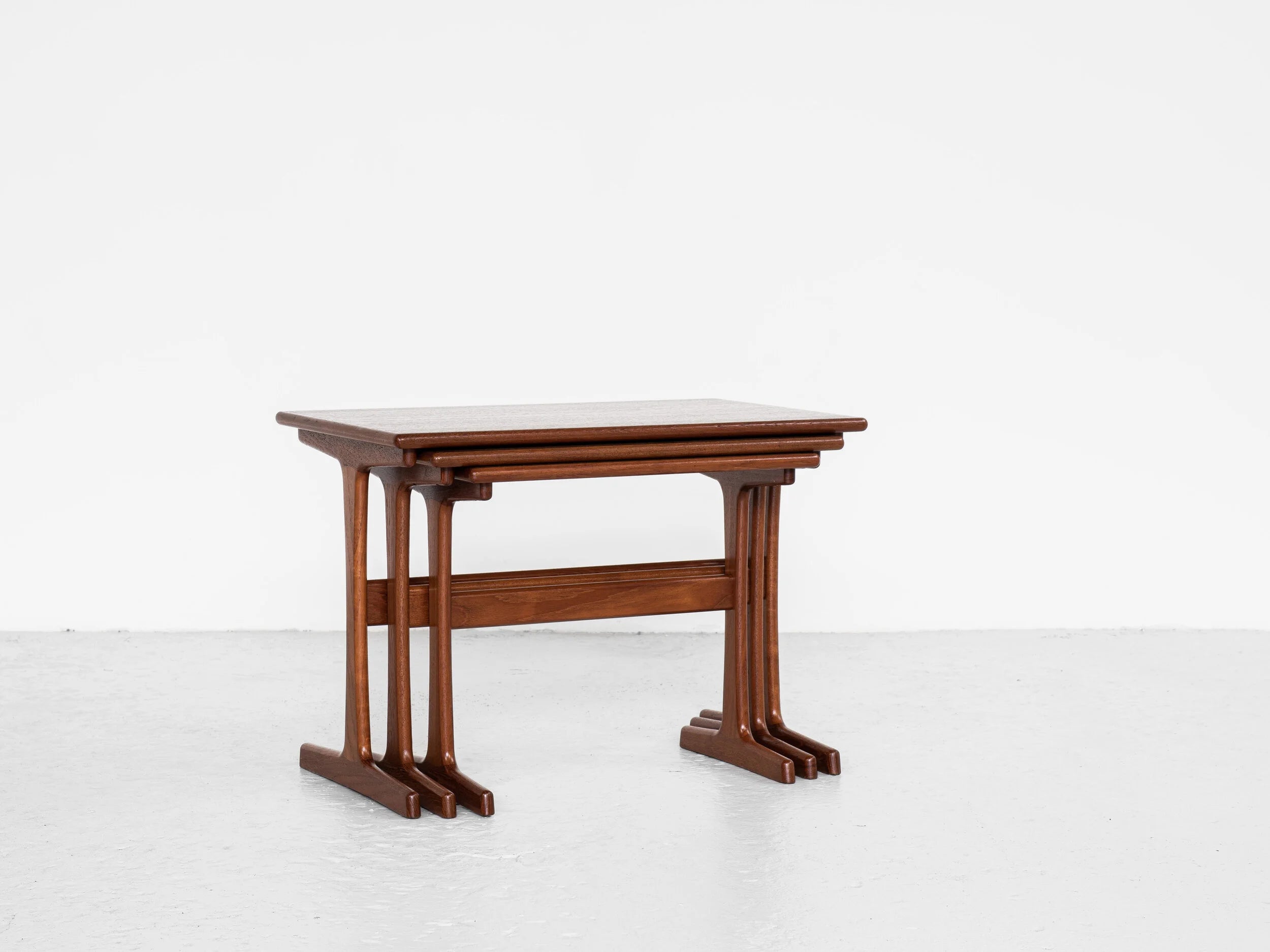 Set_of_3_Midcentury_nest_side_tables_in_teak_by_Kai_Kristiansen_for_Vildbjerg