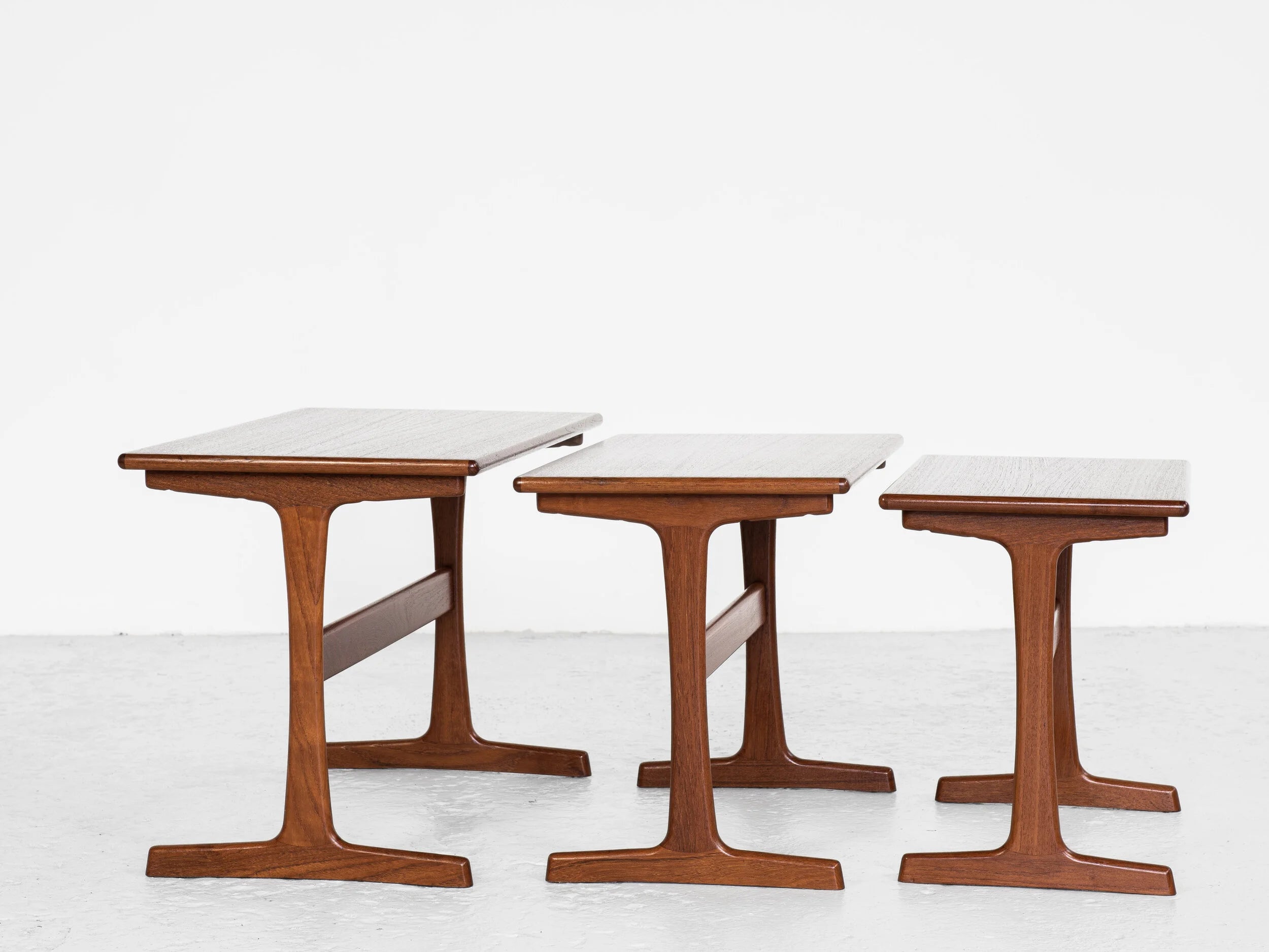 Set_of_3_Midcentury_nest_side_tables_in_teak_by_Kai_Kristiansen_for_Vildbjerg