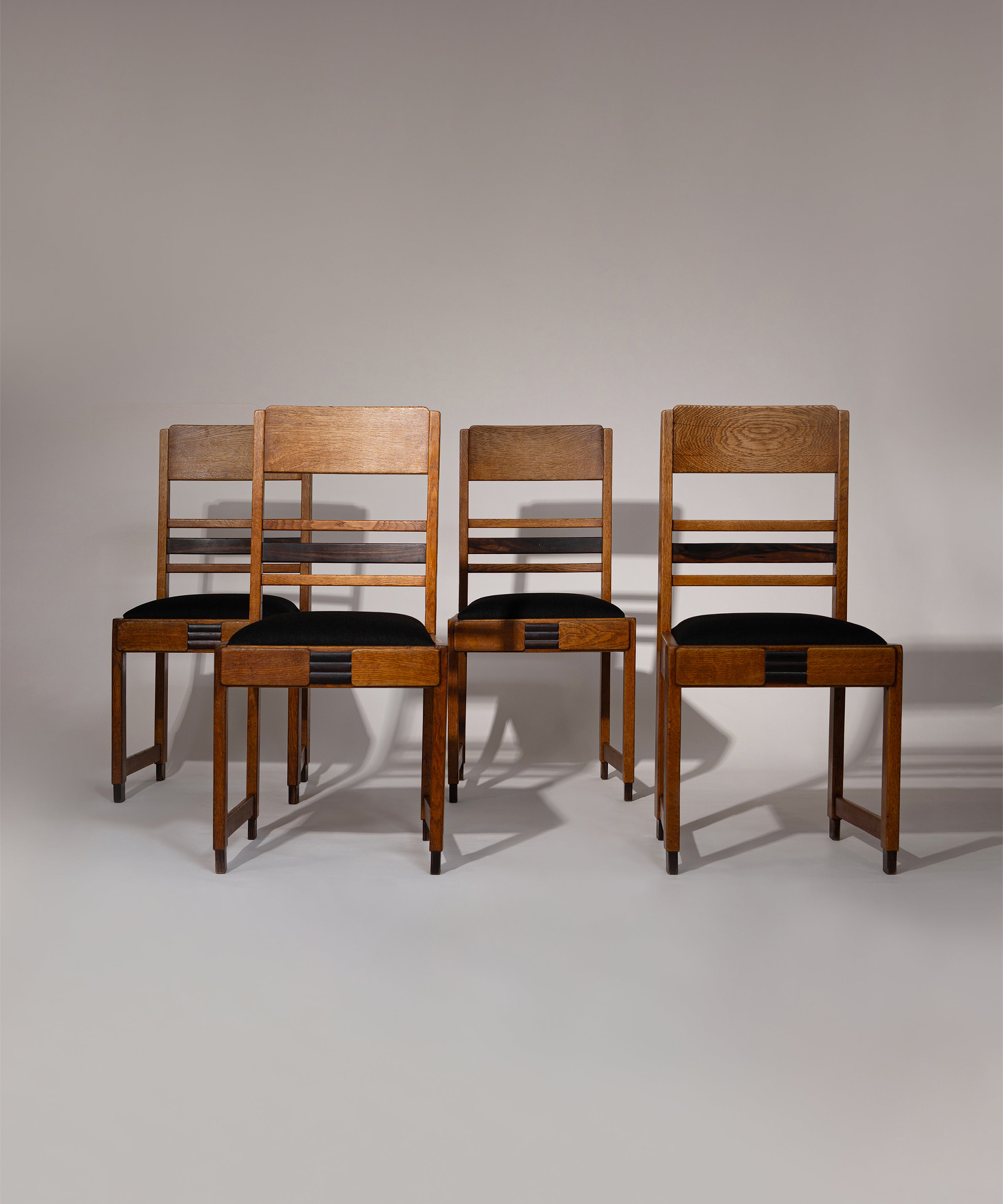 Set_of_4_Amsterdam_School_Oak_Dining_Chairs,_Netherlands_1920s