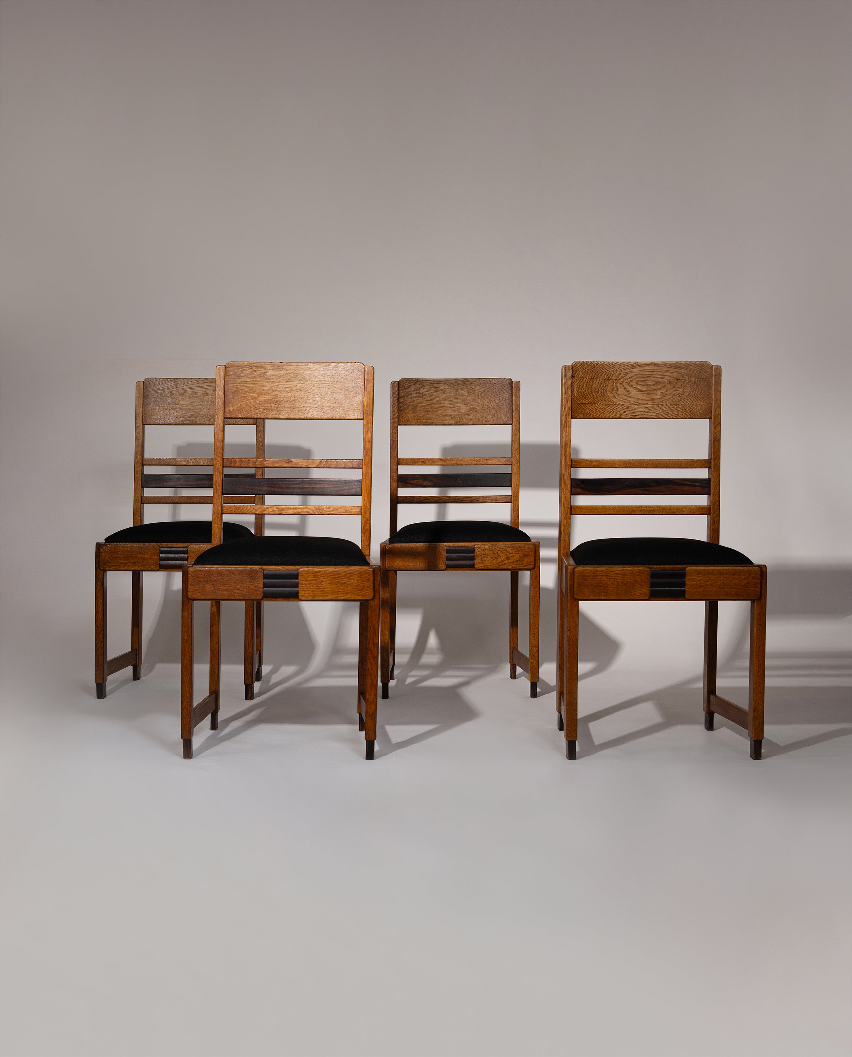 Set_of_4_Amsterdam_School_Oak_Dining_Chairs,_Netherlands_1920s