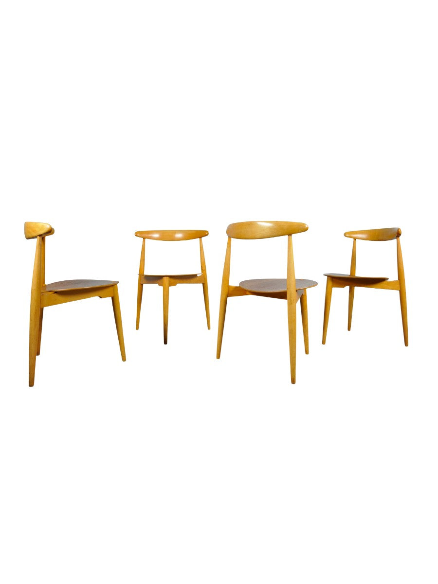 Set_of_4_Beech_&_teak_dining_chairs,_by_Hans_J._Wegner_&_Fritz_Hansen,_Denmark_1950s