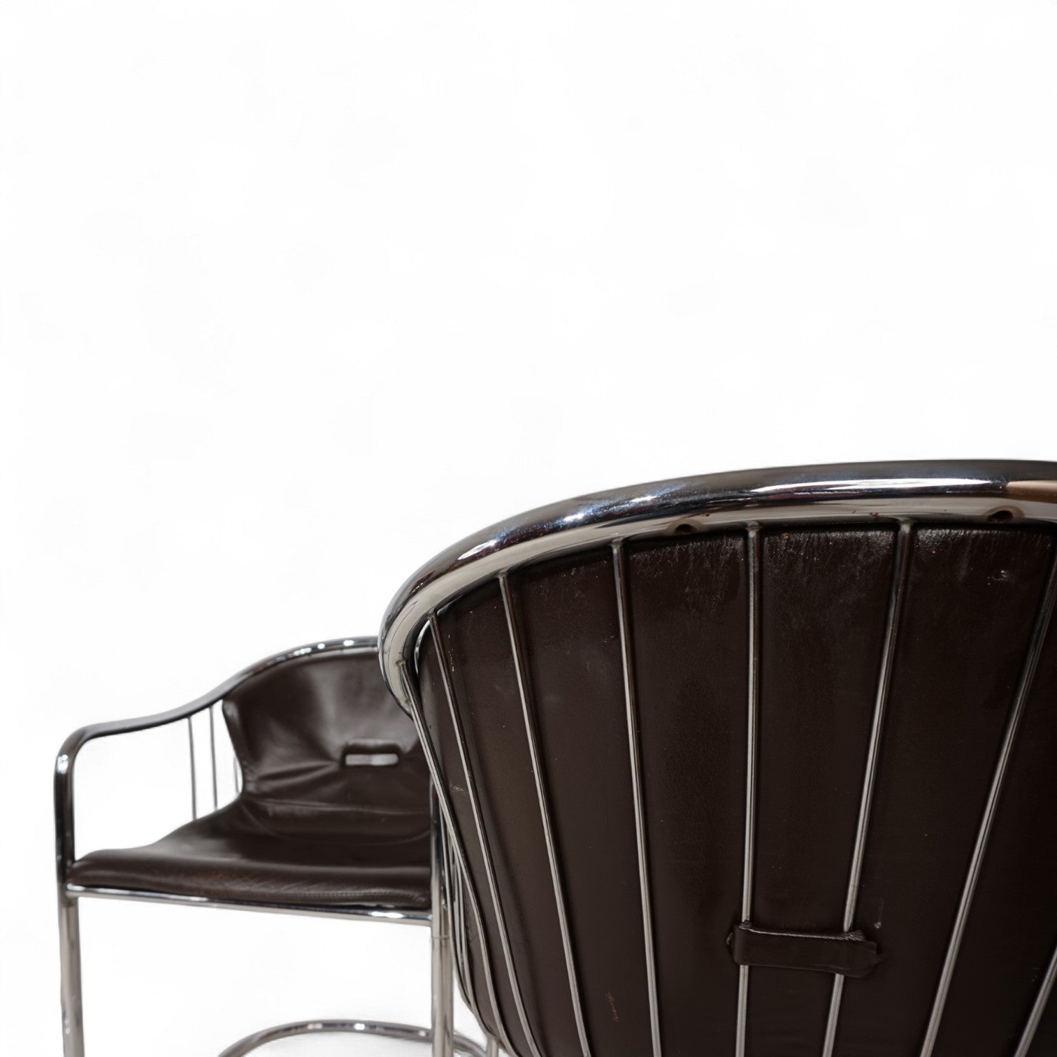 Set_of_4_chrome_dining_chairs_by_Gastone_Rinaldi_for_Thema_from_1970