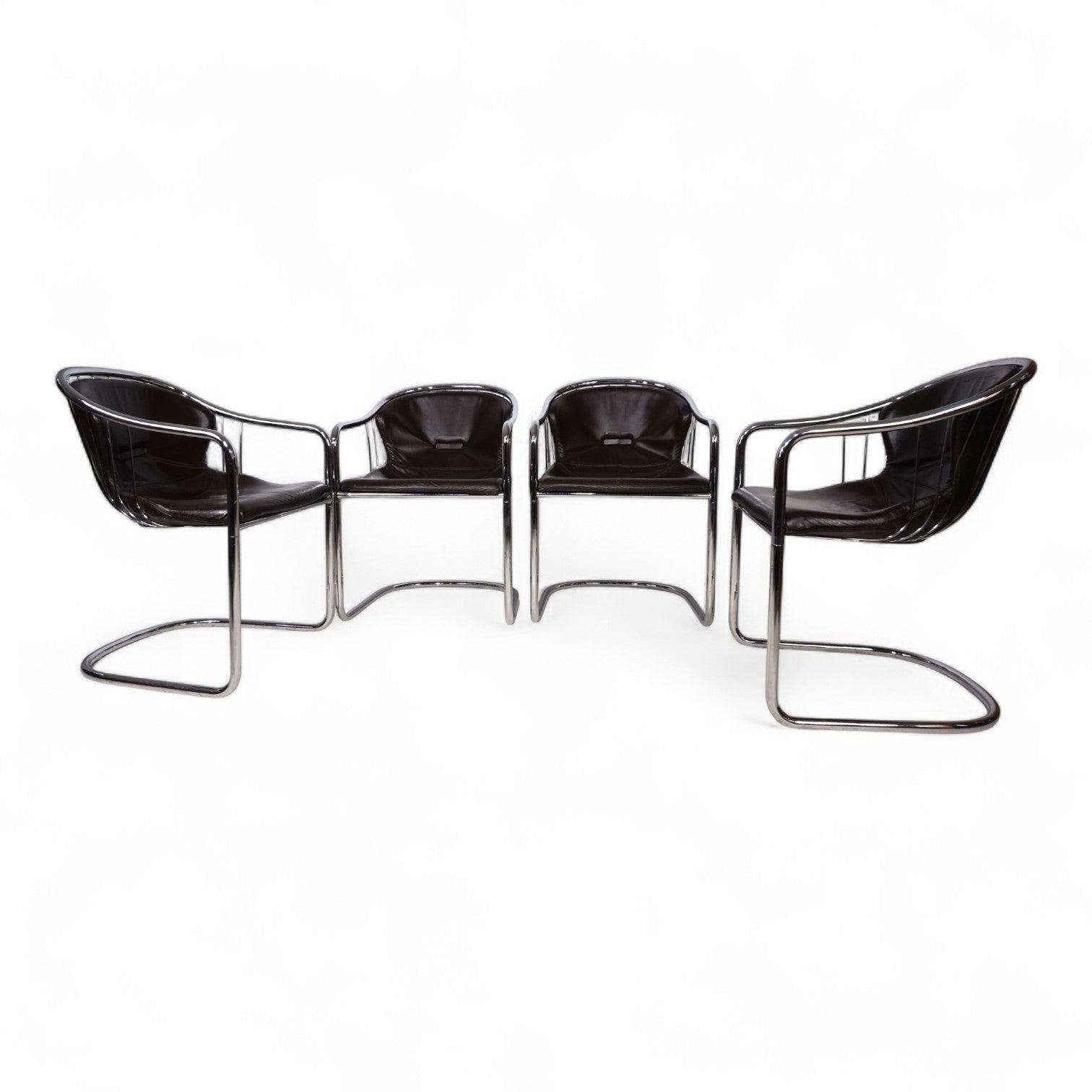 Set_of_4_chrome_dining_chairs_by_Gastone_Rinaldi_for_Thema_from_1970