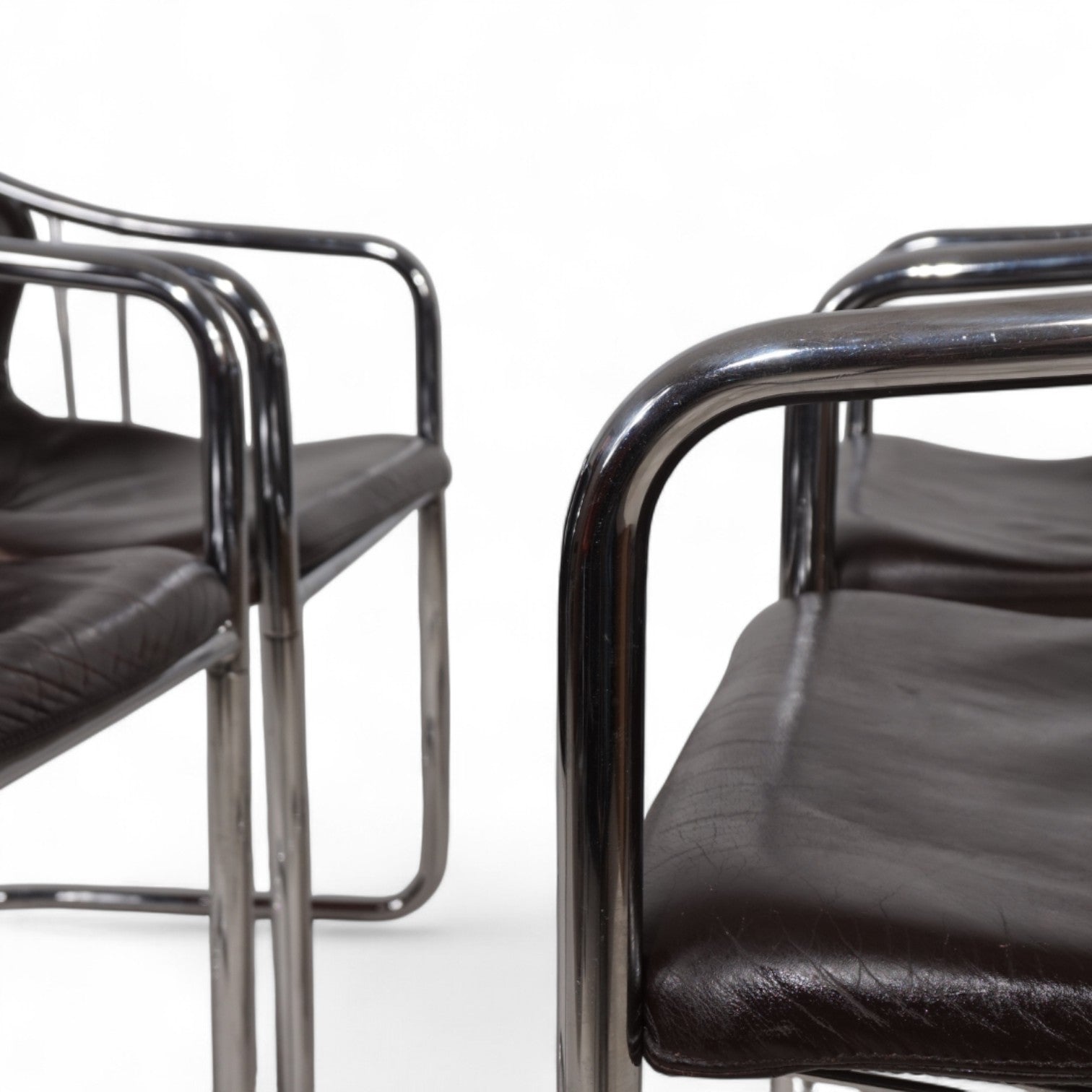 Set_of_4_chrome_dining_chairs_by_Gastone_Rinaldi_for_Thema_from_1970