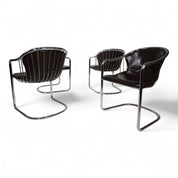 Set_of_4_chrome_dining_chairs_by_Gastone_Rinaldi_for_Thema_from_1970