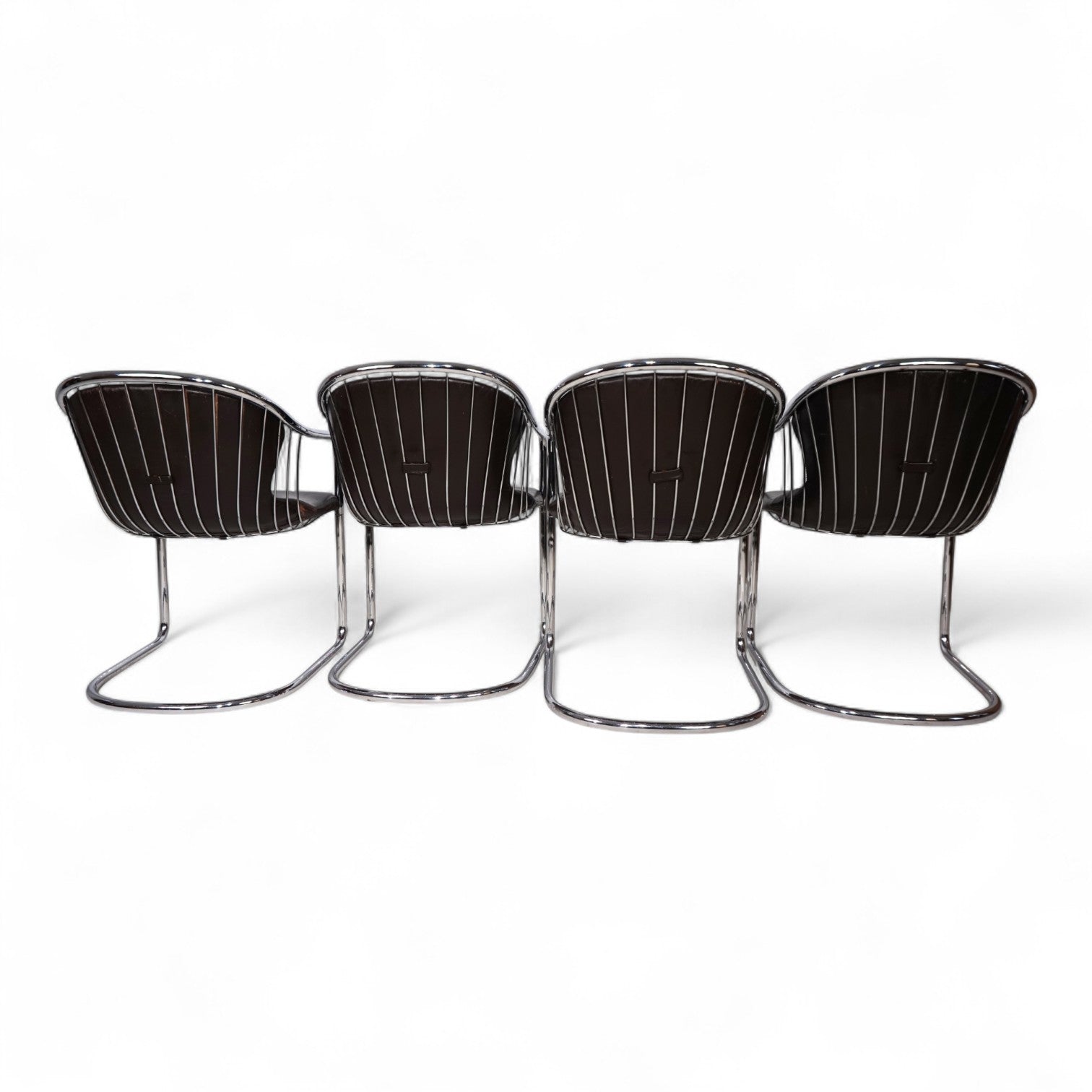 Set_of_4_chrome_dining_chairs_by_Gastone_Rinaldi_for_Thema_from_1970