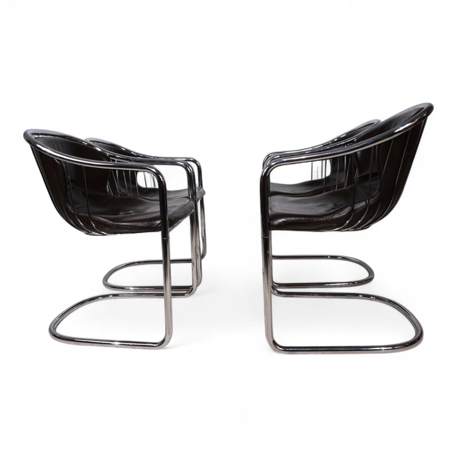 Set_of_4_chrome_dining_chairs_by_Gastone_Rinaldi_for_Thema_from_1970