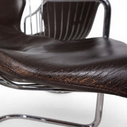 Set_of_4_chrome_dining_chairs_by_Gastone_Rinaldi_for_Thema_from_1970