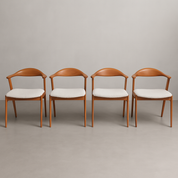 Set_of_4_Erik_Kirkegaard_dining_chairs_with_Bouclé_upholstery